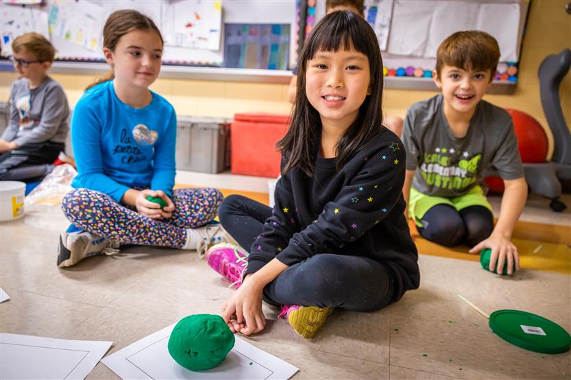 Students make planets out of Play-Doh